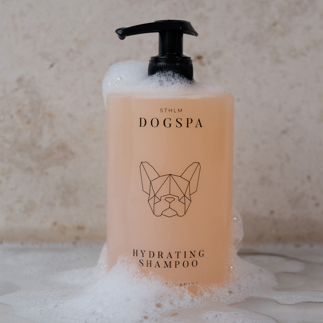 hydrating dog shampoo, bottle with suds